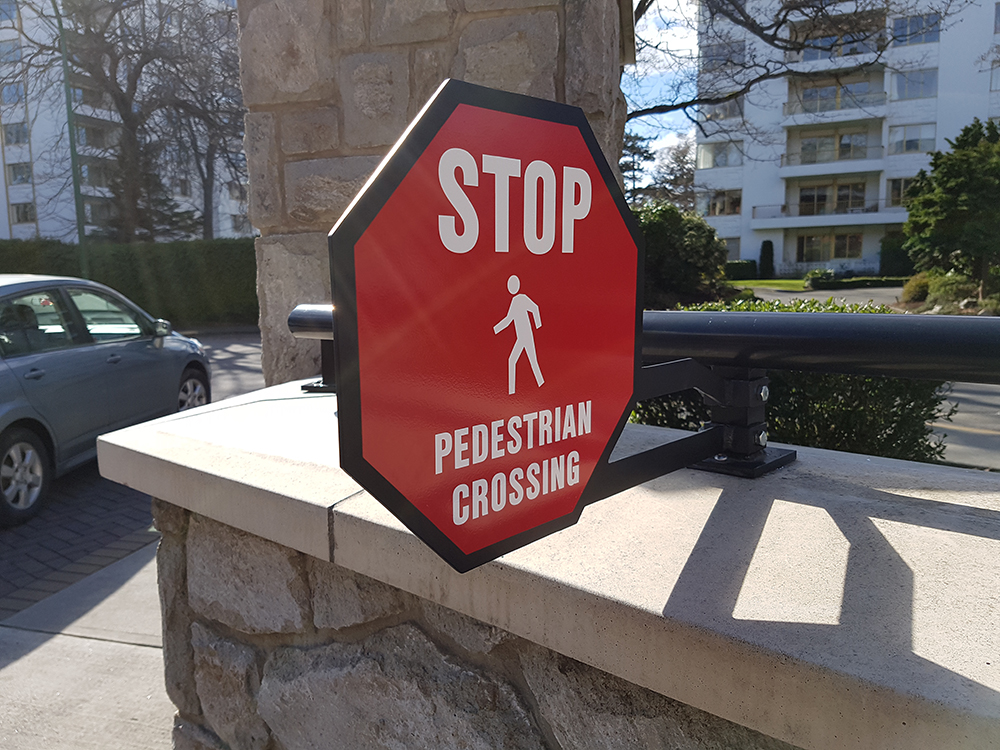 stop pedestrian crossing sign
