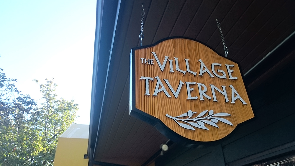 the village taverna cedar sandblasted sign